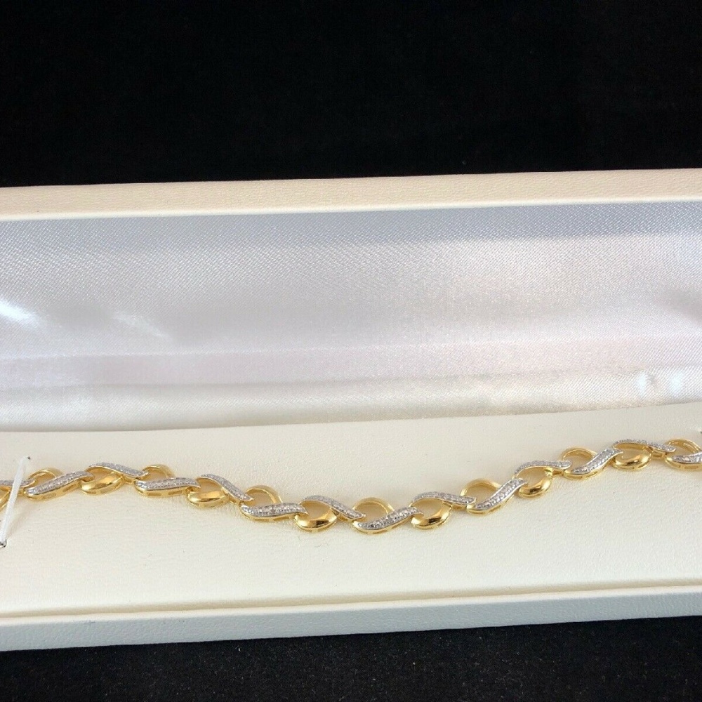 18 KT Gold Diamond Accent Infinity Bracelet  $250 nwb